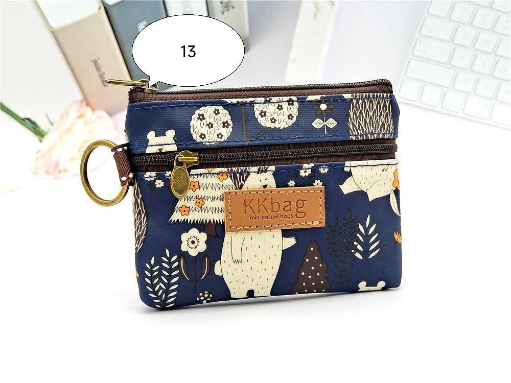 W62, 2024 New Printed Coated Cartoon Coin Purse Anti-fouling and Waterproof Lipstick Coin Storage Bag for Women
Size: 12* 10cm