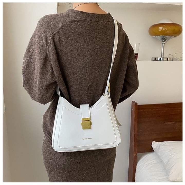 a022, fashion women shoulder bag. The product is a pu leather bag.