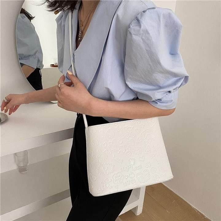 A084, Korean version of the bag on the new French niche sense bucket bag women 2023 tide summer all-match western style shoulder Messenger bag women