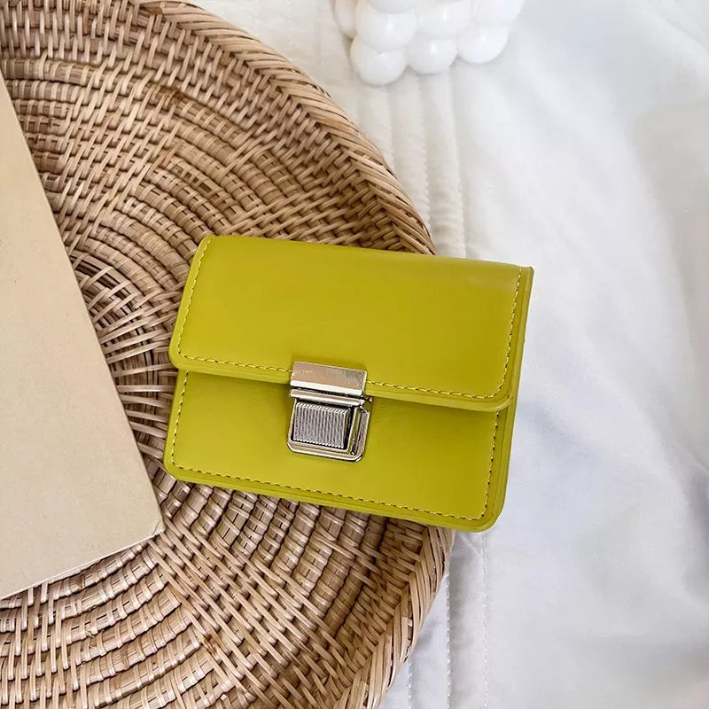 W093, Korean version wallet female mini niche simple portable temperament clamshell metal buckle card bag female ins student wallet