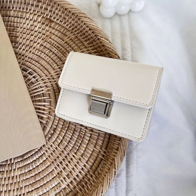 W093, Korean version wallet female mini niche simple portable temperament clamshell metal buckle card bag female ins student wallet