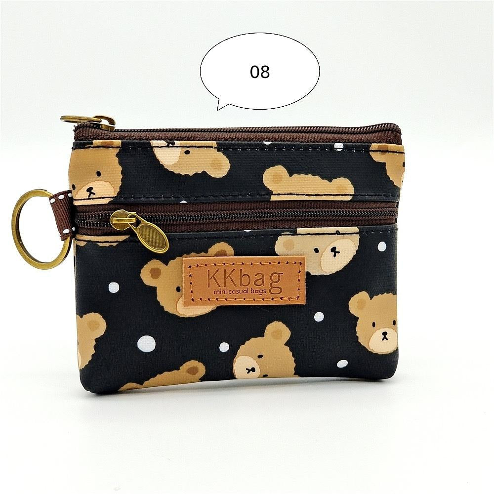 W062, 2024 New Printed Coated Cartoon Coin Purse Anti-fouling and Waterproof Lipstick Coin Storage Bag for Women
Size: 12* 10cm