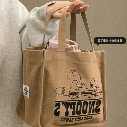 C065, Bags for women, fashionable and compact, new Snoopy canvas bag, cartoon portable, large-capacity tote bag storage bag