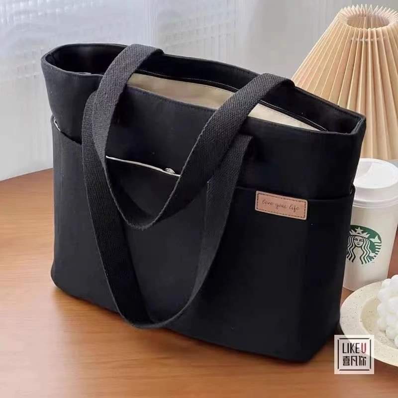 m058, shoulder bag, canvas handbag, large capacity, can hold a lot of things, suitable for traveling.