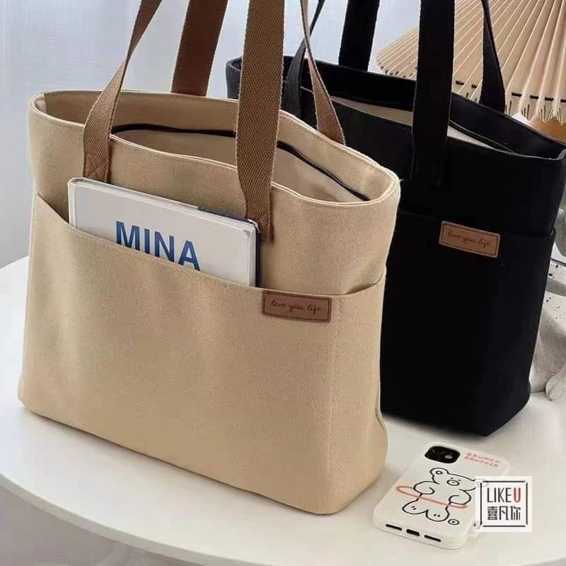 m058, shoulder bag, canvas handbag, large capacity, can hold a lot of things, suitable for traveling.